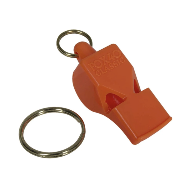 Orange signal whistle with integrated key ring, compact and robust for emergencies during water sports.