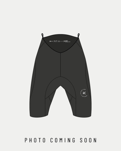 Dunkelgraue Neoprenshorts mit breitem Bund, reduzierter Optik und flexiblem Material für dynamischen Paddelsport.